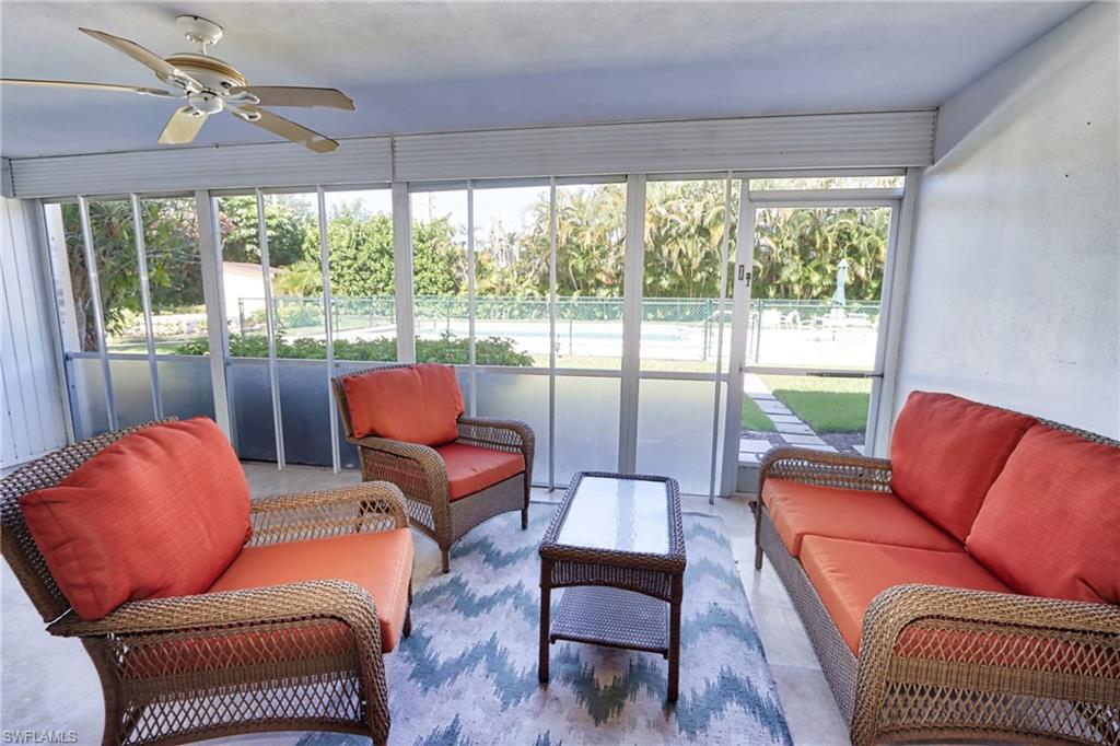 Sunroom / solarium featuring a wealth of natural light and ceiling fan