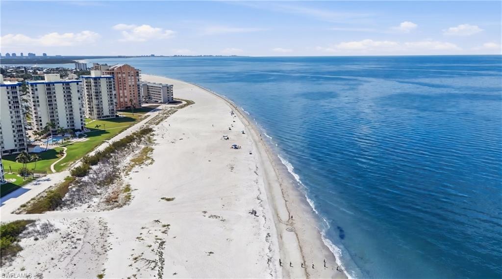 Expansive beachfront property featuring direct access to the sandy shoreline and the Gulf of Mexico - Virtually Edited Image