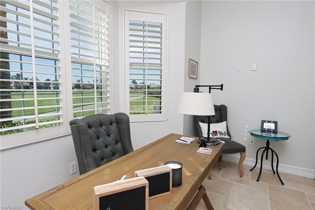 Home office with tile patterned floors
