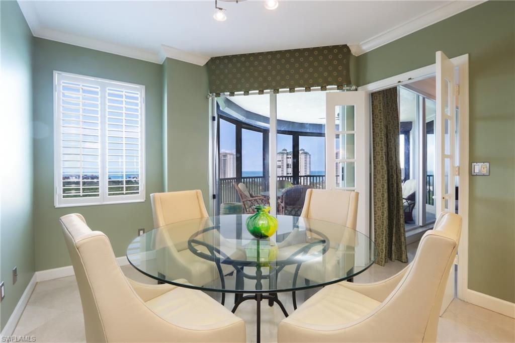 Dining room featuring crown molding