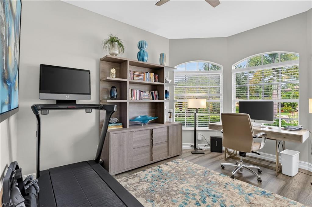 Versatile interior space being used as an office but will easily serve as a large bedroom featuring ample natural light