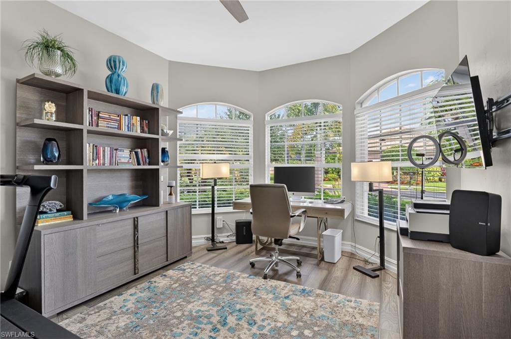 This 3rd bedroom is being used as an office with enough area for workout equipment, storage, functional office space and room to spare