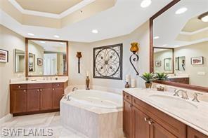 Dual sinks & jetted soaking tub.