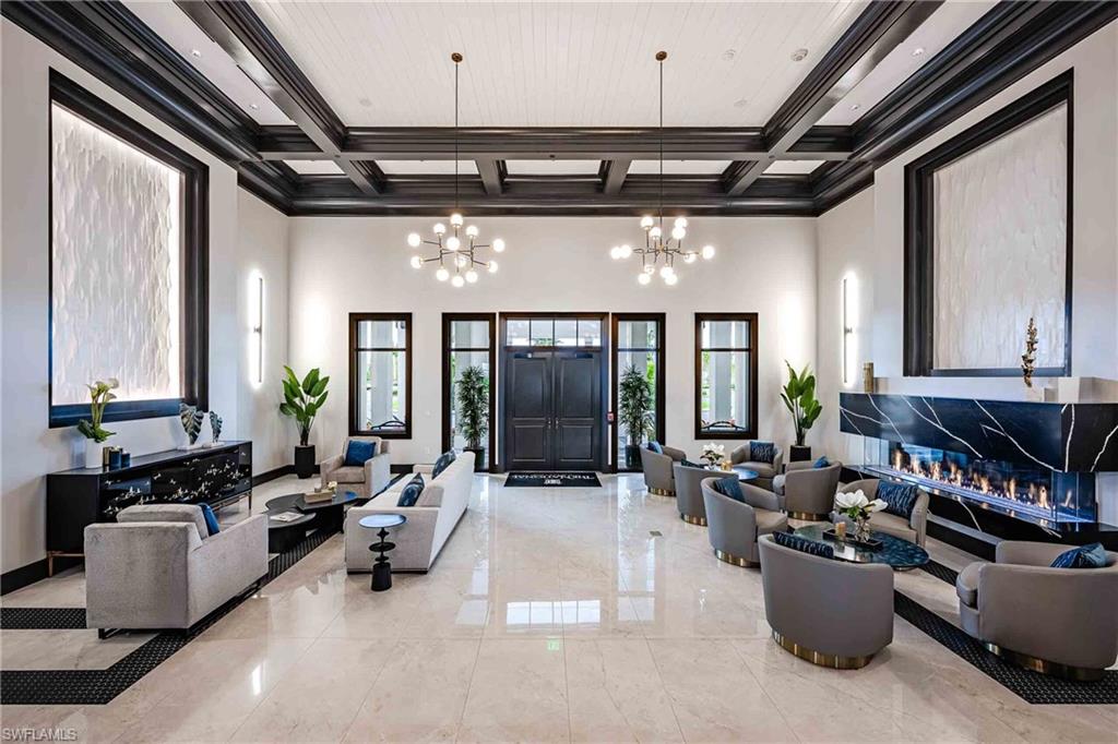 Common area featuring coffered ceiling