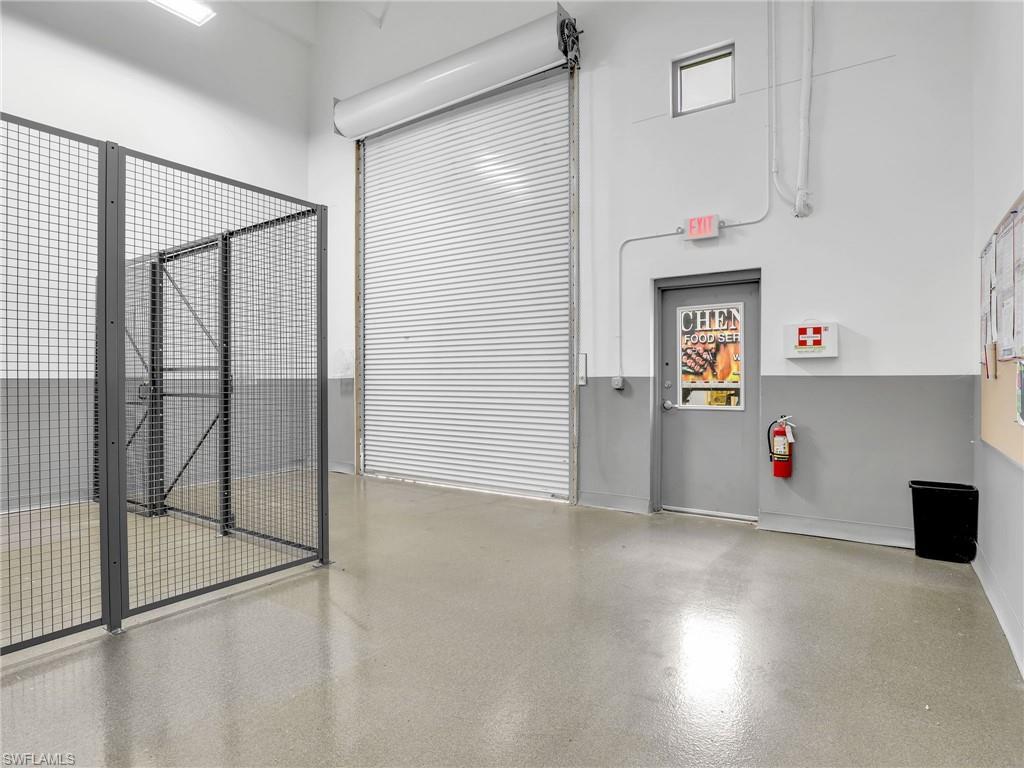 Warehouse featuring 10ft wide x 13ft tall overhead door.