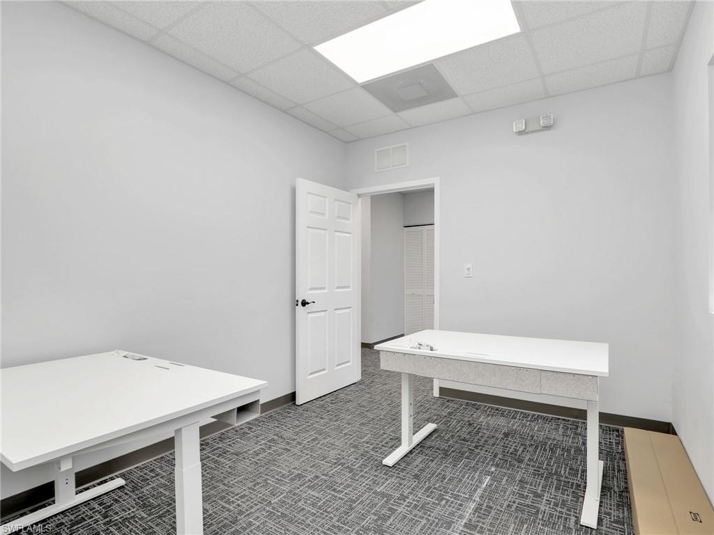 Light gray walls with dark gray baseboard trim
