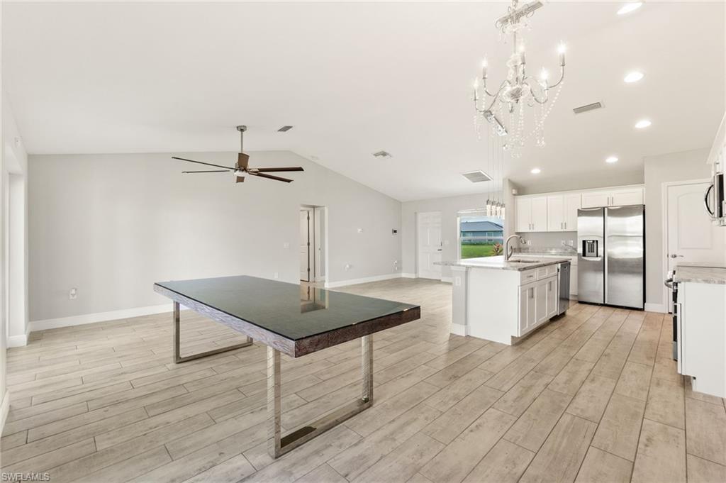 Vaulted ceilings frame the open concept living space