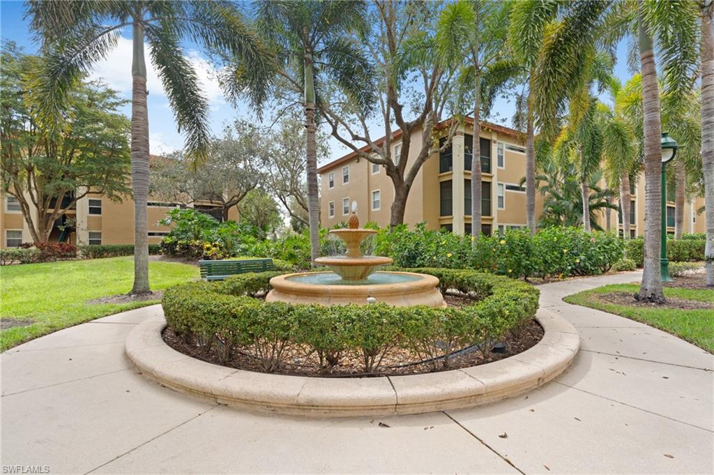 View of home's community featuring a lawn