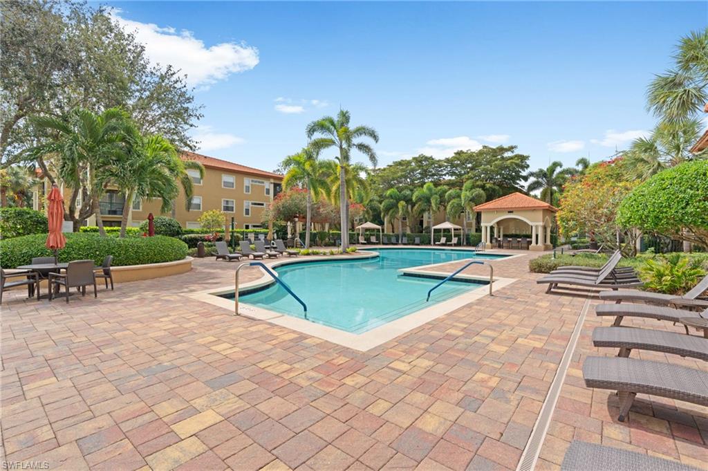 Community pool featuring a gazebo and a patio