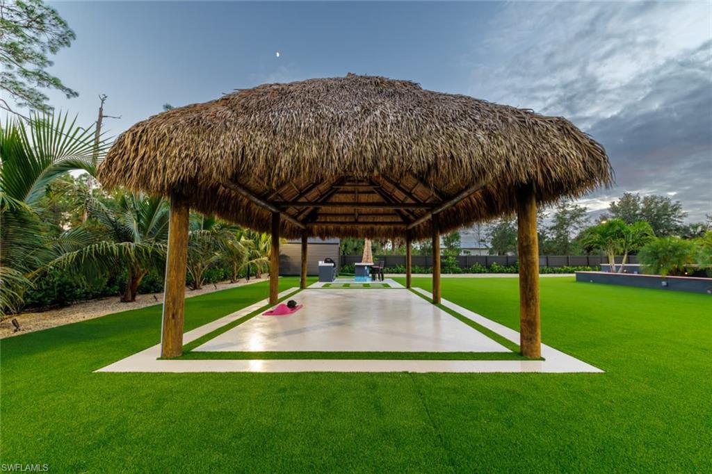 View of property's community with a patio area and a gazebo
