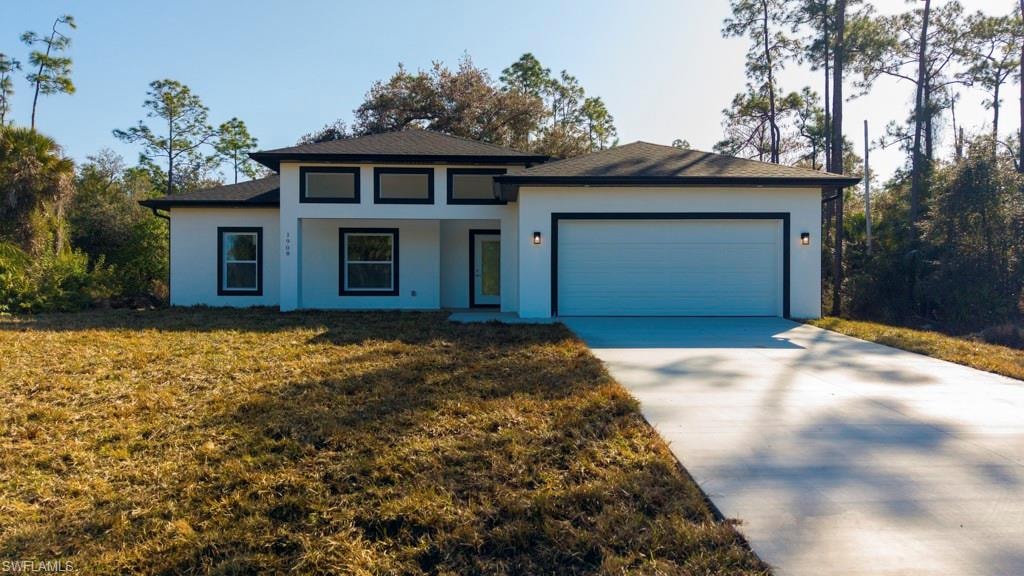 Contemporary exterior with white stucco finish and contrasting black trim