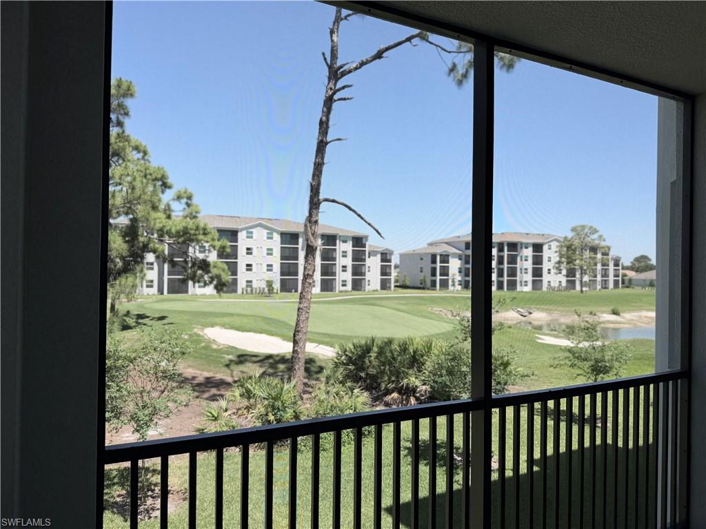 View of the golf course and other apartments from the lanai