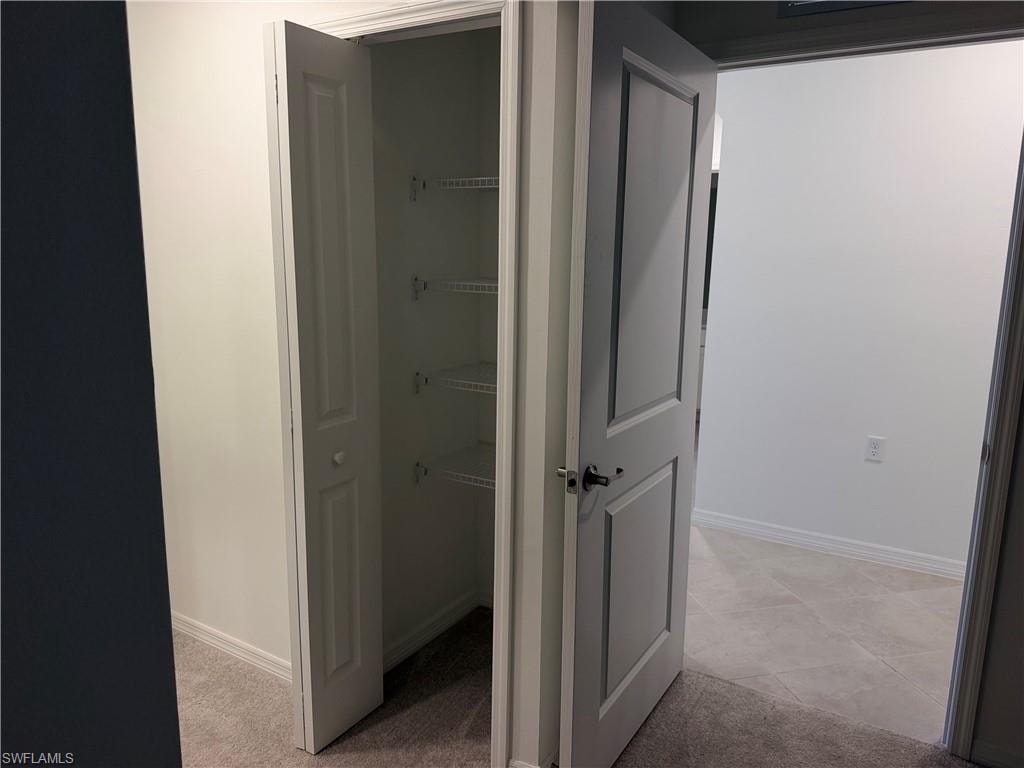 Storage closet in the primary bedroom