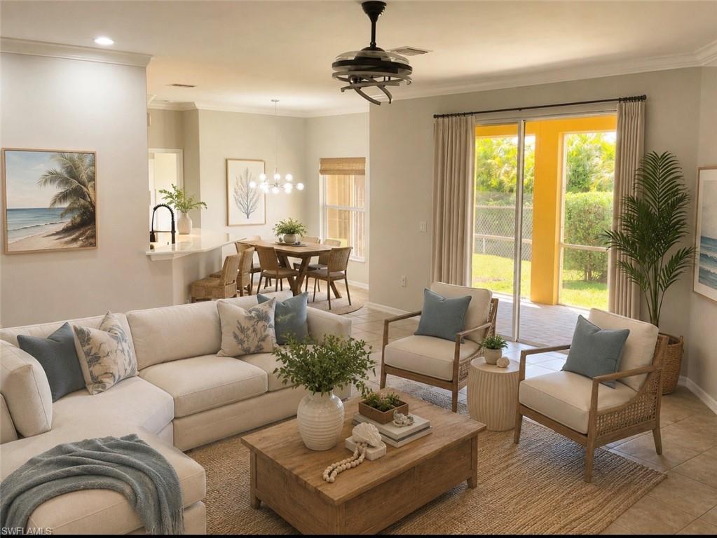 Expansive living area featuring tile flooring and a ceiling fan with integrated lighting