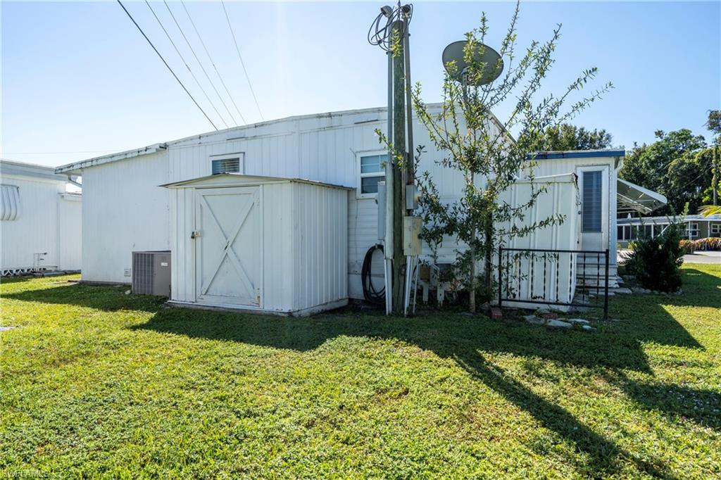 View of additional outdoor shed at back of property