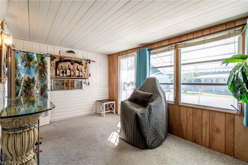 Enclosed front porch with lots of natural light