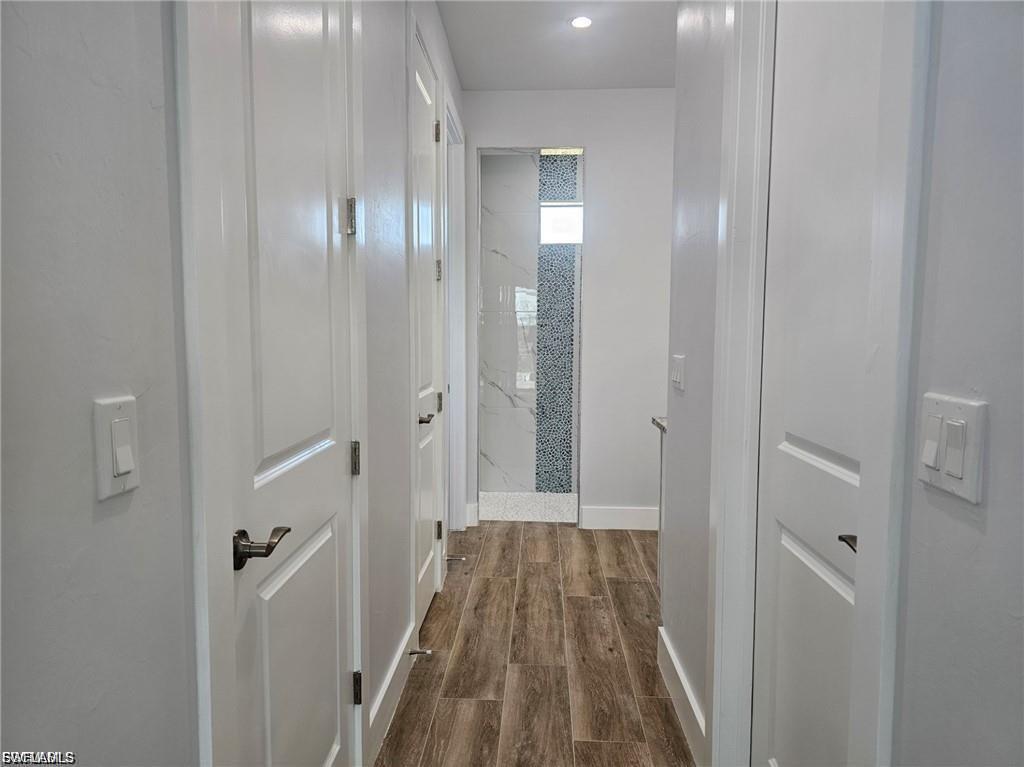 Hallway leading to Primary Bathroom