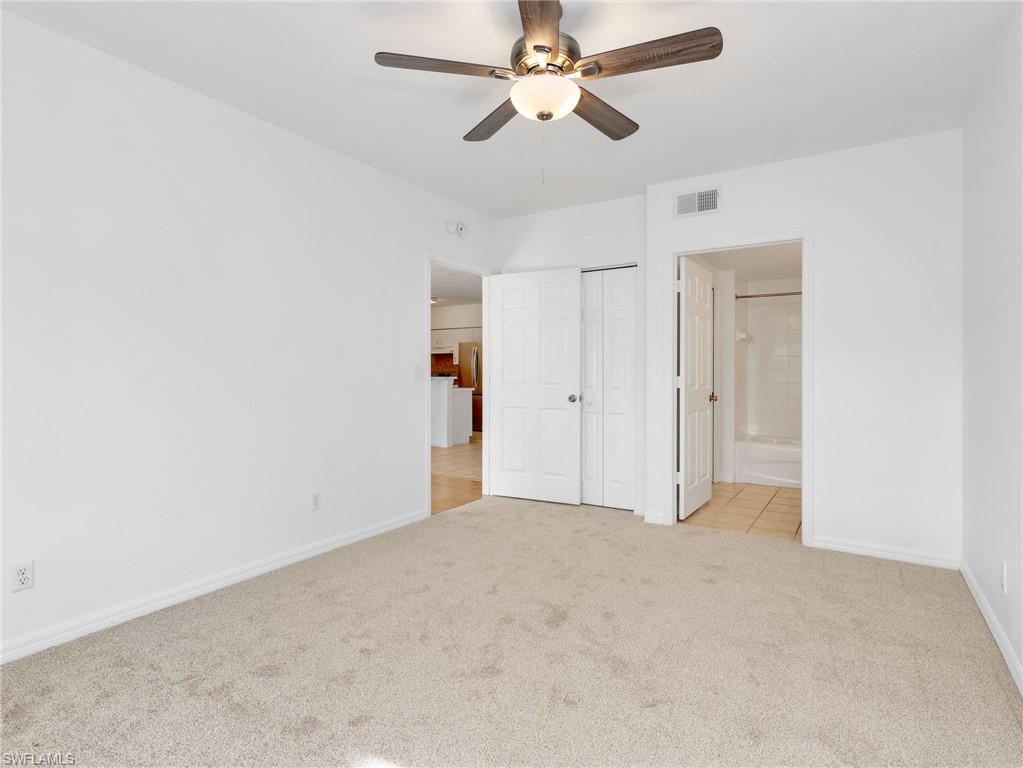 Guest Bedroom Suite with New Carpet & Ceiling Fan - Door To Bathroom & Another Door From Bathroom To Living Area/Entry