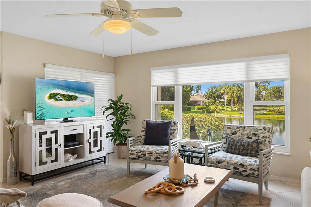 Living Room with Smart TV and Lake View