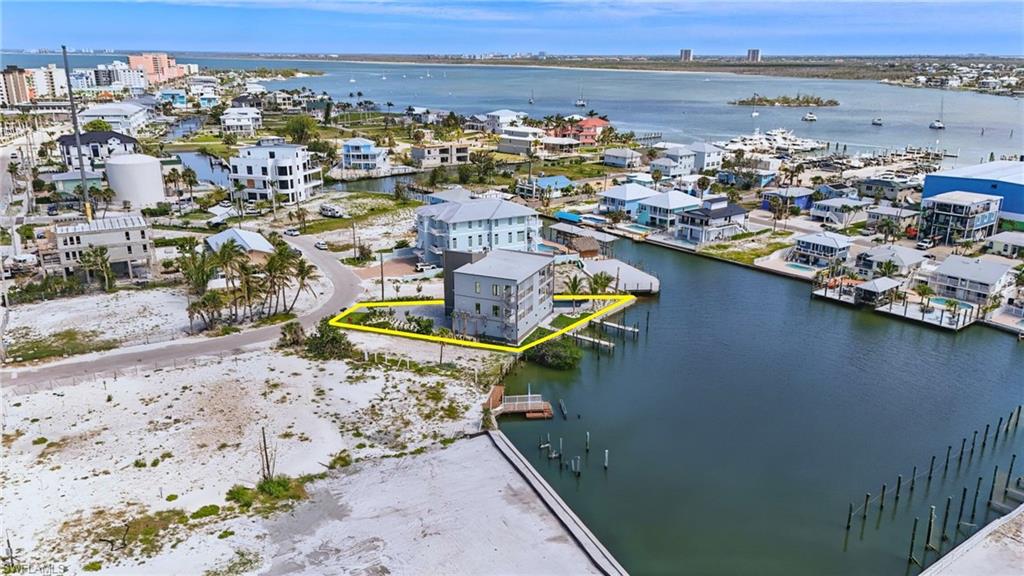 Bird's eye view of property on lagoon - VIRTUALLY EDITED