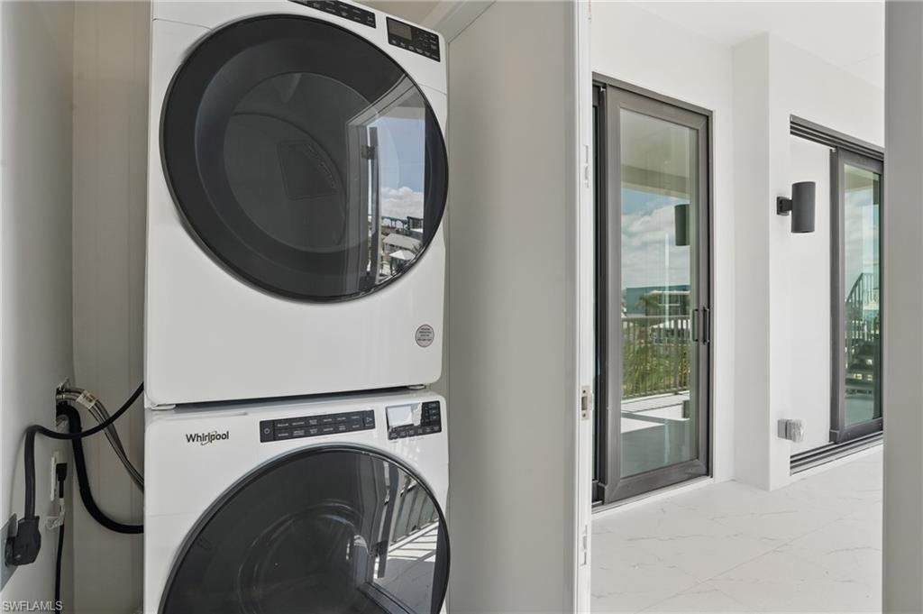 Dtacked washer / dryer and marble look tile flooring - VIRTUALLY EDITED