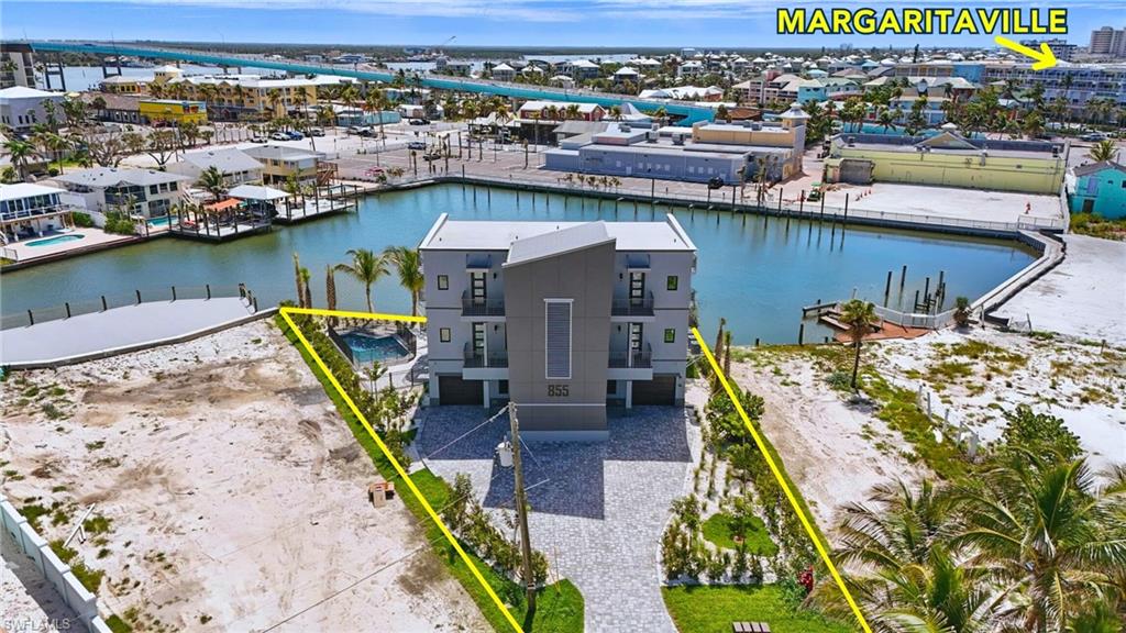 Modern multi-story property featuring a flat roofline and private balconies - Virtually Edited Image