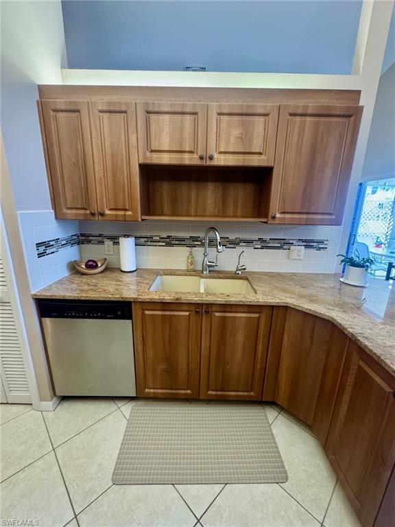 Granite counters and tiled backsplash