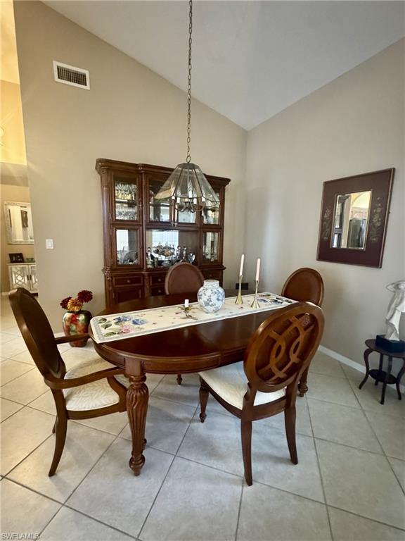 Dining area with vaulted ceilings