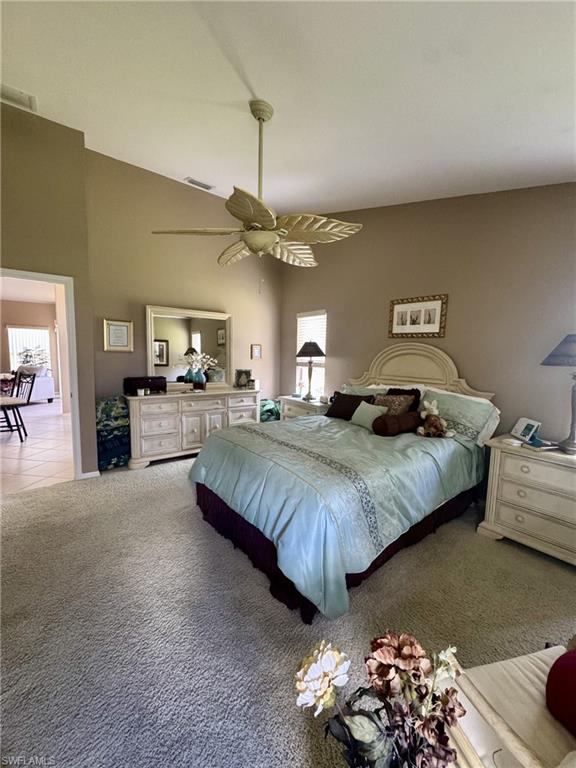 Primary suite with vaulted ceilings