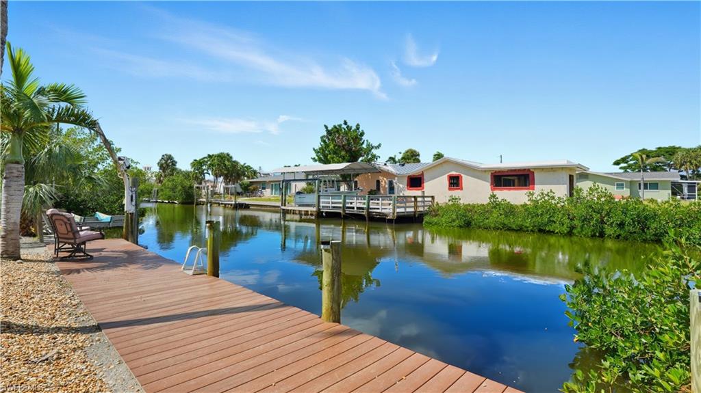 Dock area with Gulf access canal view- Virtually Edited Image