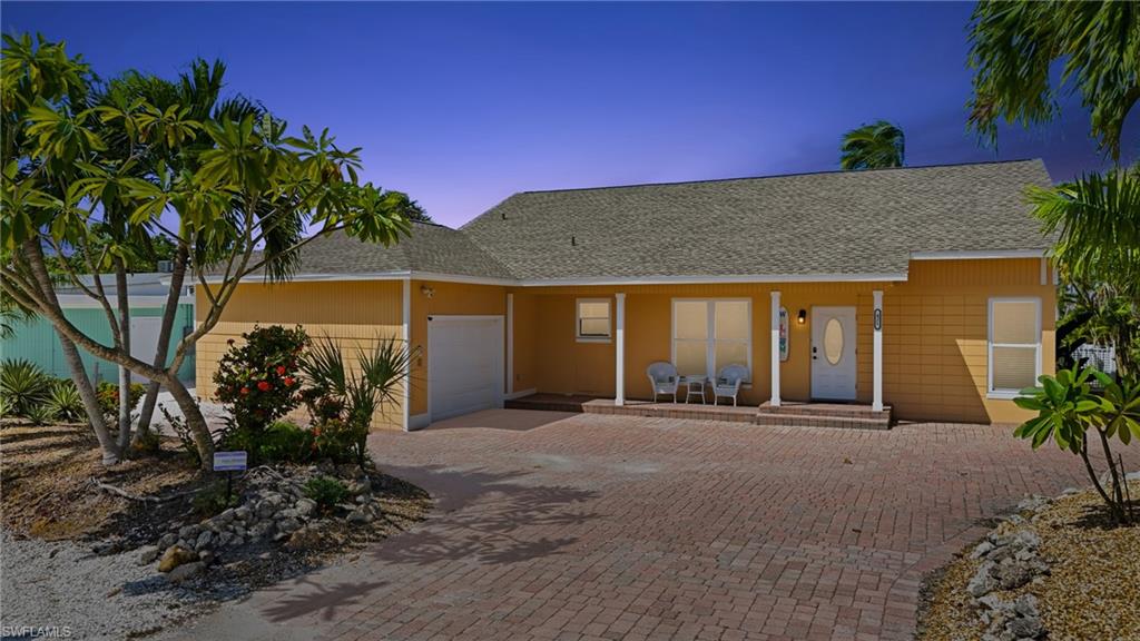 Front of property at dusk-- Virtually Edited Image
