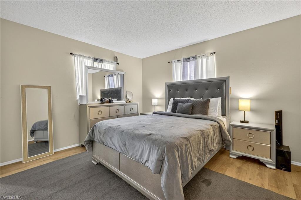Neutral-toned walls complement wood-finish flooring