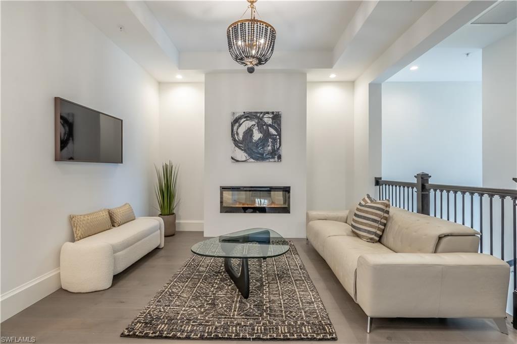 Media room with electric fire place or  office, den space