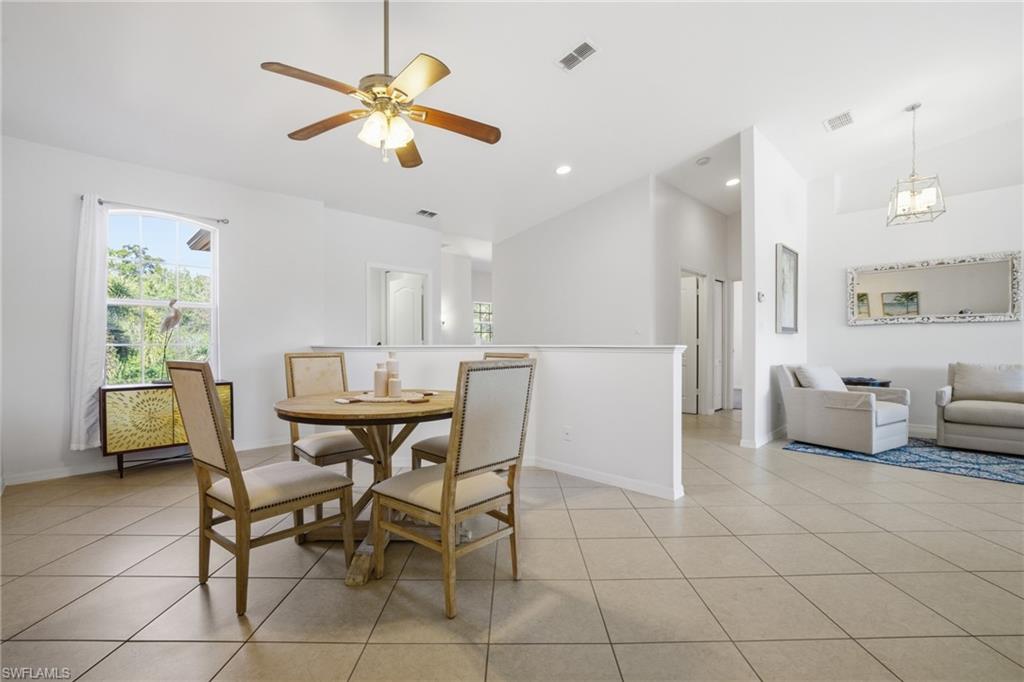 Dining/flex room vaulted ceiling, and lighted ceiling fan