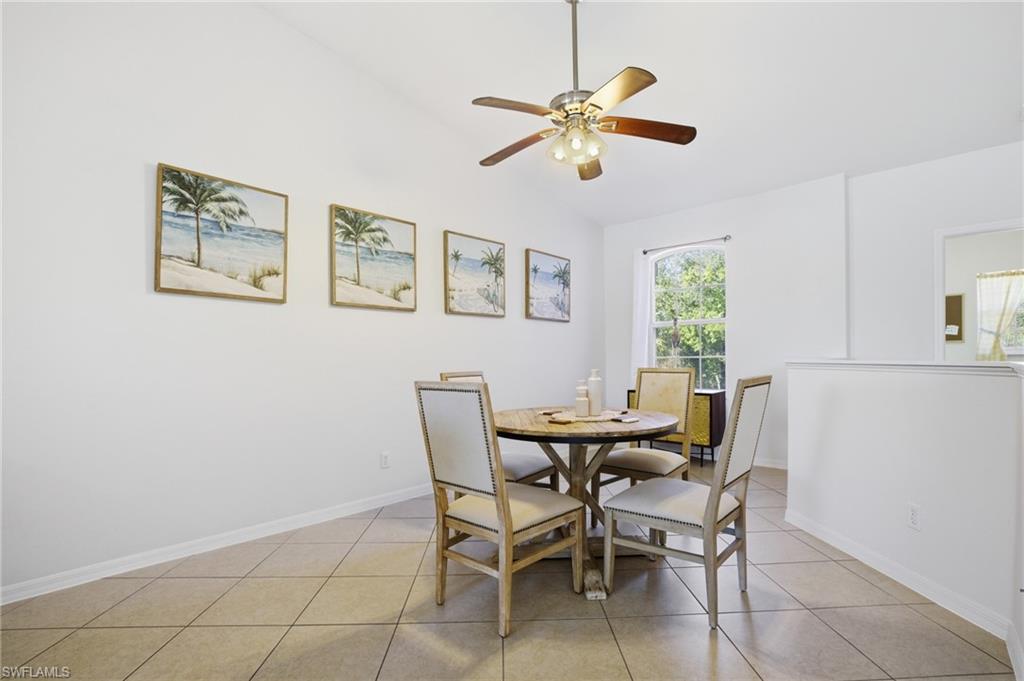Dining/flex room vaulted ceiling, and lighted ceiling fan