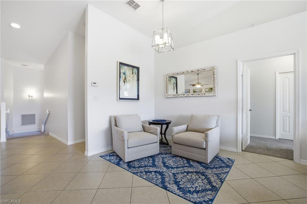 Dining or Living area with chandelier