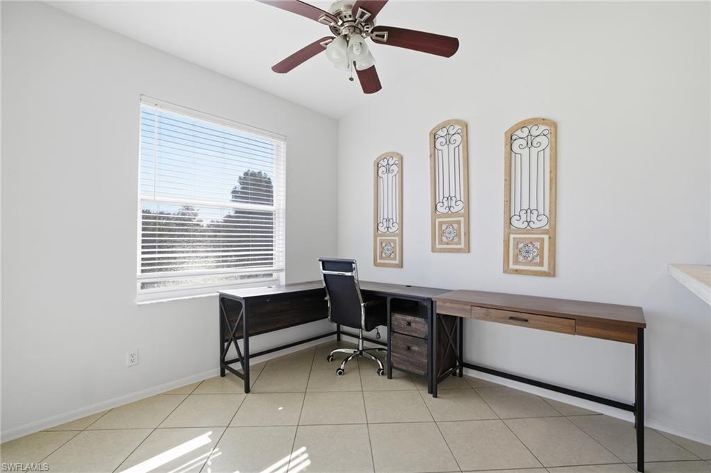 Office space or breakfast room with lighted ceiling fan