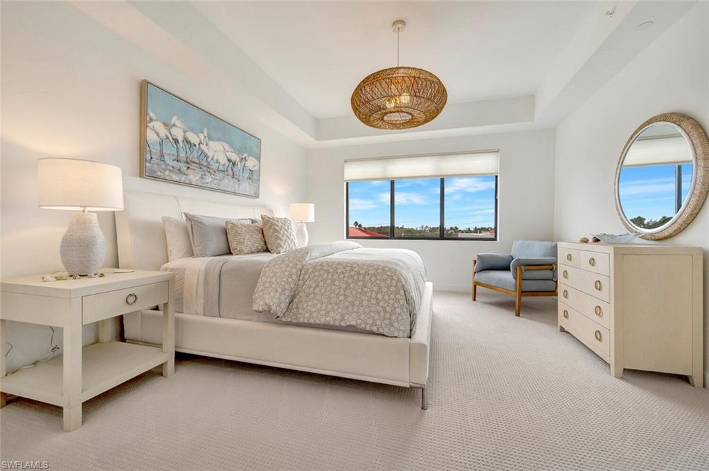 Primary Bedroom/King-Sized Bed