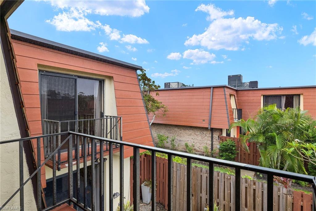 Upper-level balcony with black metal railing