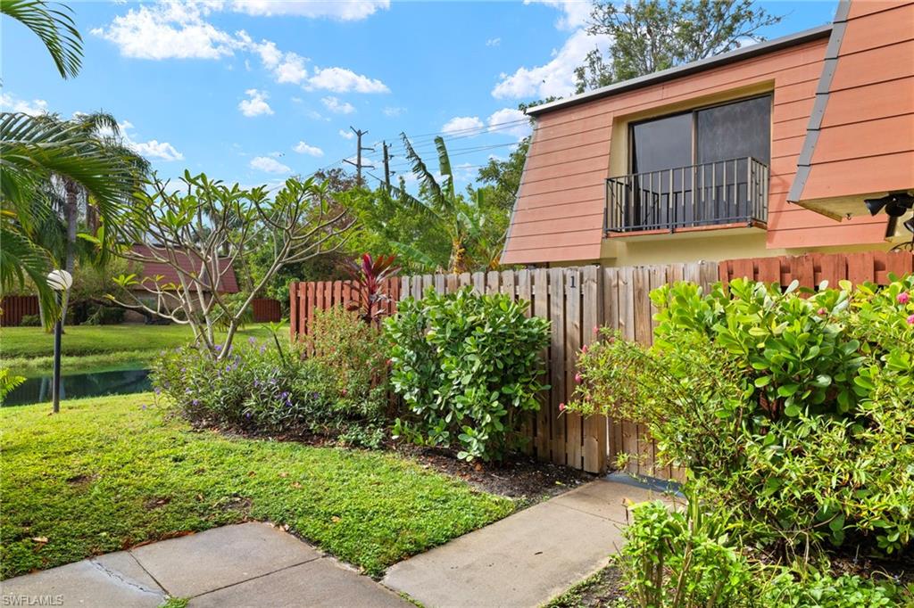 A-frame property exterior with a private balcony featuring an iron railing