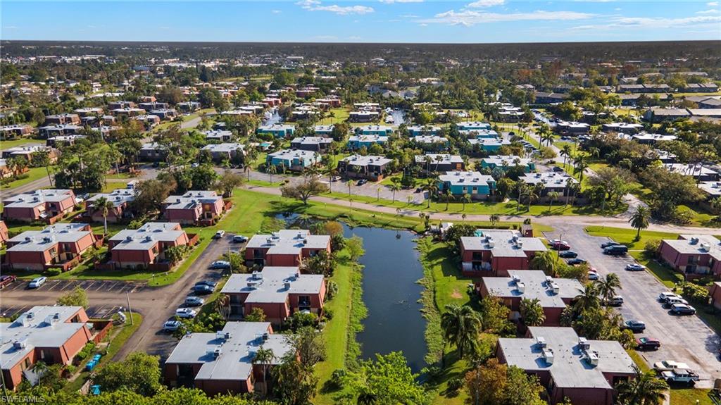 Aerial perspective showcasing a residential community with numerous properties