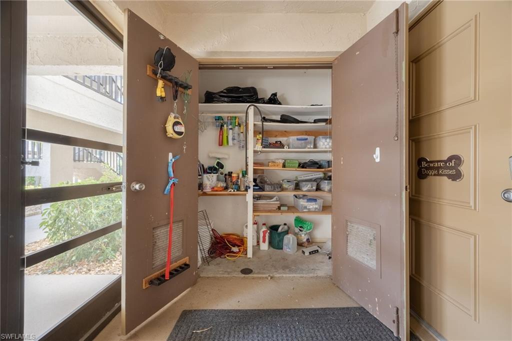 Utility closet with shelving for organized storage