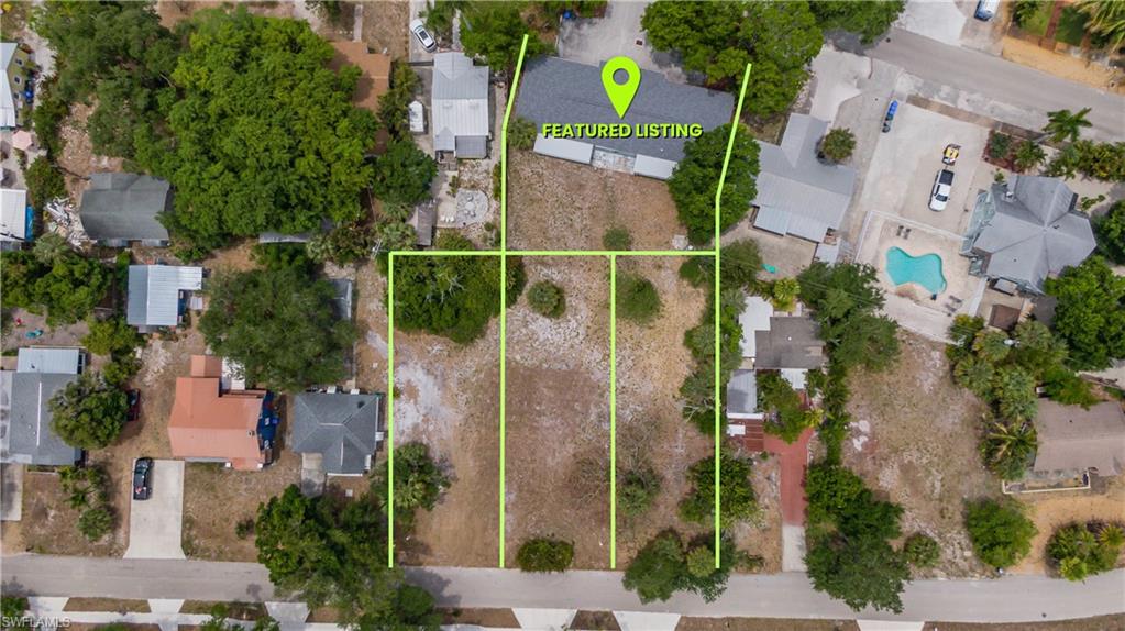 Birdseye view of duplex and three lots