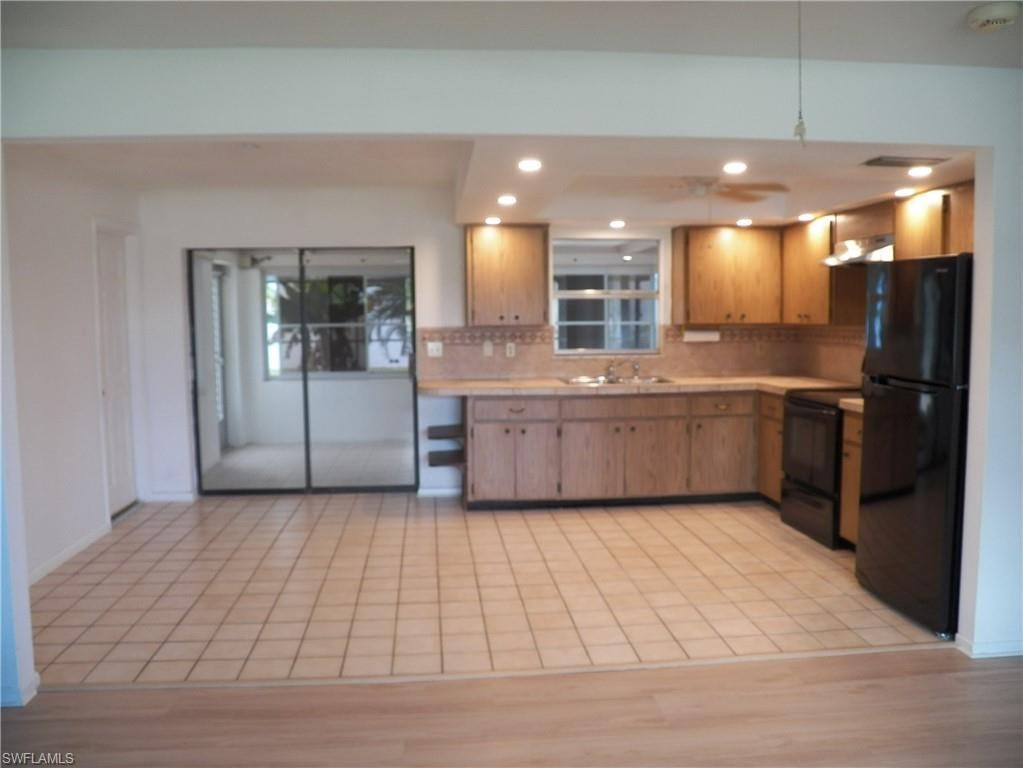 Dining area with sliders to the Florida room and pool