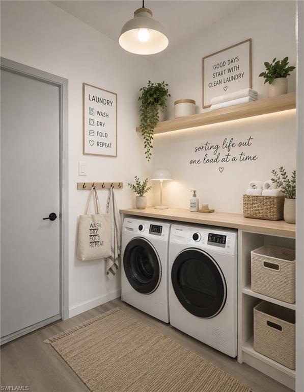Dedicated laundry area featuring wood-finish flooring-Virtually Staged