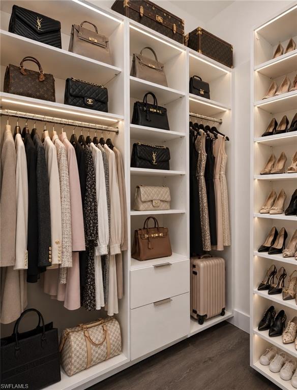 Custom closet system featuring integrated shelving, hanging rods, and drawers