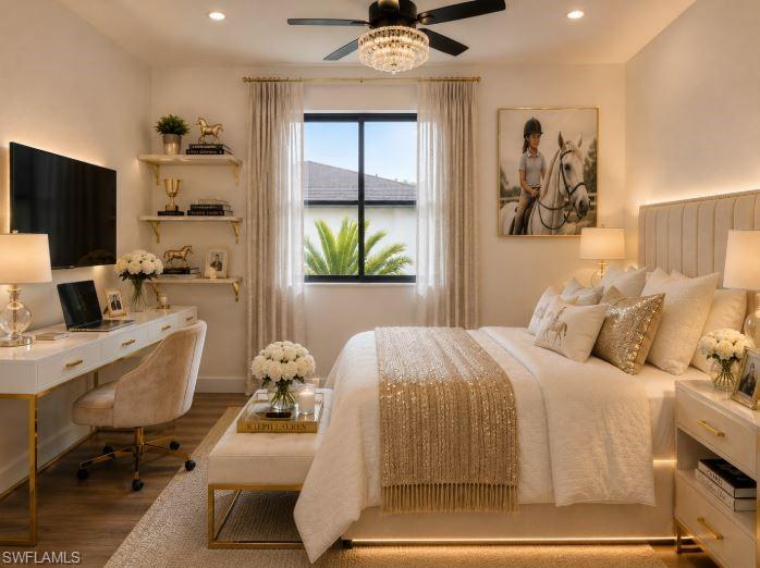 Bedroom featuring wood-finish flooring and a window with drapes