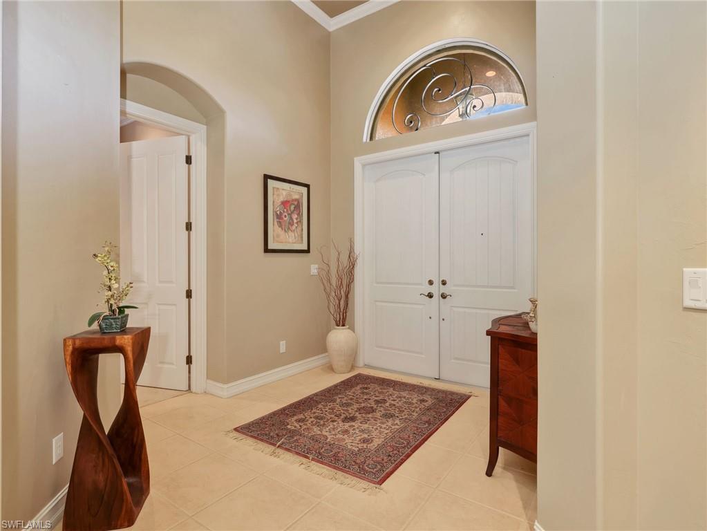Front Foyer with Double Doors & Arched Window