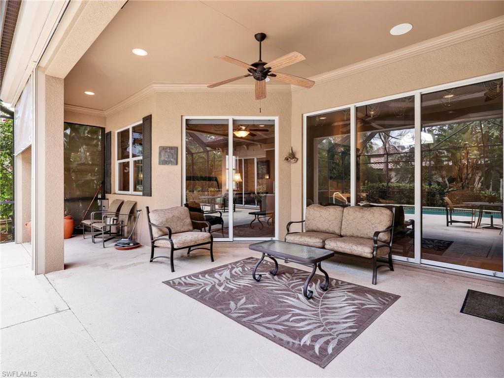Under Cover Lanai with Sliding Glass Doors to Living Room & Primary Bedroom