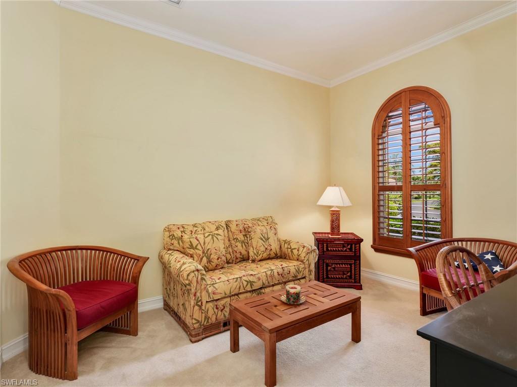 Third Bedroom with Crown Molding, & Arched Window with Planation Shutters